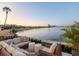 Inviting backyard patio with plush seating, city views, and lush greenery at 2807 W Hawthorne Rd # 11, Tampa, FL 33611