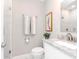 Bright bathroom with modern fixtures, granite countertop, and mosaic tile shower at 2807 W Hawthorne Rd # 11, Tampa, FL 33611