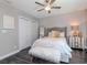 Bedroom with generous closet space and modern decor featuring soft tones and textures at 2807 W Hawthorne Rd # 11, Tampa, FL 33611