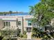 Beautiful exterior view overlooking the water with city skyline in the background at 2807 W Hawthorne Rd # 11, Tampa, FL 33611