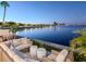 Relaxing waterfront patio seating with stunning views of the water and city skyline at 2807 W Hawthorne Rd # 11, Tampa, FL 33611