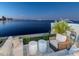 Stylish waterfront outdoor seating area with panoramic views of the city skyline at 2807 W Hawthorne Rd # 11, Tampa, FL 33611
