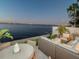 Inviting waterfront outdoor seating area perfect for relaxation and enjoying water views at 2807 W Hawthorne Rd # 11, Tampa, FL 33611