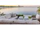 Inviting patio area with comfortable seating, ideal for enjoying the waterfront views and sunset at 2807 W Hawthorne Rd # 11, Tampa, FL 33611