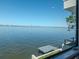 Enjoy breathtaking waterfront views from this property featuring a private dock and stunning city skyline in the distance at 2807 W Hawthorne Rd # 11, Tampa, FL 33611