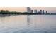 Scenic waterfront view with calm water reflecting the city skyline at twilight at 2807 W Hawthorne Rd # 11, Tampa, FL 33611