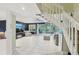 Open-concept living room with lots of space, views, and an easy flow to the outdoor lanai at 330 Woods Landing Trail, Oldsmar, FL 34677