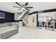 Spacious living room with open floor plan and stairs to the second floor at 330 Woods Landing Trail, Oldsmar, FL 34677