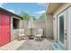 Outdoor patio with seating, privacy fence, and access to a covered area at 330 Woods Landing Trail, Oldsmar, FL 34677