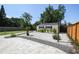 A view of the backyard with a shed and landscaping at 3315 W Pearl Ave, Tampa, FL 33611