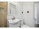 A charming bathroom with tiled shower, white vanity, and toilet at 3315 W Pearl Ave, Tampa, FL 33611