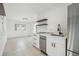 A view of the open kitchen with stainless steel appliances at 3315 W Pearl Ave, Tampa, FL 33611