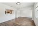 Spacious living room with open floor plan and hardwood floors at 3315 W Pearl Ave, Tampa, FL 33611