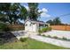 Exterior shot of the shed with a well landscaped surround at 3315 W Pearl Ave, Tampa, FL 33611
