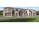 Charming townhome showcases a modern elevation with a one car garage and neutral color palette at 3469 Lapis Lake Dr, Zephyrhills, FL 33541