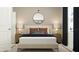 Inviting bedroom features a well-made bed, stylish decor, and relaxing ambiance at 3469 Lapis Lake Dr, Zephyrhills, FL 33541