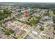Aerial view of a neighborhood with mature landscaping and a community park nearby at 3543 Gamble St, New Port Richey, FL 34655