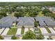 Aerial view of the home exterior featuring a driveway and a fenced-in patio at 3543 Gamble St, New Port Richey, FL 34655