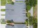 Aerial view of the home showcasing the roof, landscaping, and private fenced-in patio at 3543 Gamble St, New Port Richey, FL 34655