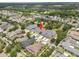 Aerial view of the home's location within a residential neighborhood with mature trees at 3543 Gamble St, New Port Richey, FL 34655