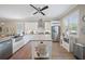 Modern kitchen with stainless steel appliances, granite countertops, and island at 3543 Gamble St, New Port Richey, FL 34655