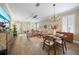 Open living space featuring a living room and dining area with modern decor and lots of light at 3543 Gamble St, New Port Richey, FL 34655