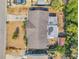 Bird's eye view of the property showcasing roof, backyard, landscaping, shed, and driveway at 3621 Beacon Square Dr, Holiday, FL 34691