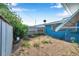 Backyard of house featuring shed and some greenery at 3621 Beacon Square Dr, Holiday, FL 34691