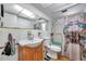 Bathroom featuring a shower/tub combo, toilet and a vanity with sink and mirror at 3621 Beacon Square Dr, Holiday, FL 34691