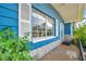 Close up of a home with attractive blue siding and classic white trim at 3621 Beacon Square Dr, Holiday, FL 34691
