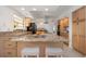 Open kitchen with a large island, bar seating, and modern appliances at 3908 Lithia Ridge Blvd, Valrico, FL 33596