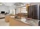 Spacious kitchen area, showcasing granite countertops, a stainless hood, and modern appliances at 3908 Lithia Ridge Blvd, Valrico, FL 33596