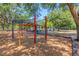 Community playground with colorful play structure and shaded picnic area at 3908 Lithia Ridge Blvd, Valrico, FL 33596