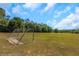 Open soccer field with neatly manicured green grass and soccer goals under a cloudy sky at 3908 Lithia Ridge Blvd, Valrico, FL 33596