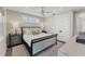 Bedroom featuring neutral walls and a large window and a double door closet at 4357 Marina View Way, Cortez, FL 34215