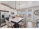 Bright kitchen features a large island with white countertops and stainless steel appliances, perfect for cooking and entertaining at 4357 Marina View Way, Cortez, FL 34215
