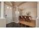 Welcoming dining room with wood floors, a chandelier, and a view of the front door at 4605 Casswell Dr, New Port Richey, FL 34652