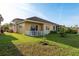 Charming one-story home showcasing a well-maintained lawn and exterior at 4605 Casswell Dr, New Port Richey, FL 34652