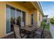 Covered back patio with table and chairs, ideal for outdoor dining at 4605 Casswell Dr, New Port Richey, FL 34652