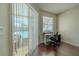 Home office space with hardwood floors, lots of light, and views to the pool at 4612 River Overlook Dr, Valrico, FL 33596