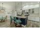 Well-appointed kitchen features granite countertops, stainless appliances and a breakfast bar at 4612 River Overlook Dr, Valrico, FL 33596