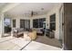 Covered patio with comfortable seating and a ceiling fan, great for enjoying the outdoors at 4612 River Overlook Dr, Valrico, FL 33596