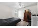 Bedroom featuring wood-look flooring, closet, and natural light at 490 Knight Dr, Tarpon Springs, FL 34688