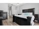Spacious main bedroom with an ensuite bathroom and a ceiling fan at 490 Knight Dr, Tarpon Springs, FL 34688