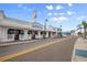 Street view of Hellas Restaurant, showing architecture and inviting streetscape with clear blue sky at 490 Knight Dr, Tarpon Springs, FL 34688