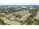 An aerial view of the homes, pond and landscaping in this quiet neighborhood at 5344 Sylvester Loop, Tampa, FL 33610