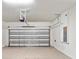 Spacious two-car garage featuring an automatic door and ample storage at 5344 Sylvester Loop, Tampa, FL 33610