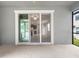Covered patio featuring sliding glass doors leading to interior at 5344 Sylvester Loop, Tampa, FL 33610