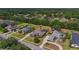Residential neighborhood featuring mature trees, manicured lawns, and spacious properties at 5507 Keeler Oak St, Lithia, FL 33547