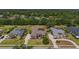 Sprawling property showcasing mature trees, expansive lawns, a screened pool, and a multi-car driveway at 5507 Keeler Oak St, Lithia, FL 33547